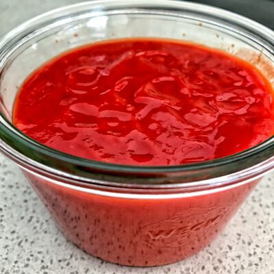 glas container with hot sauce